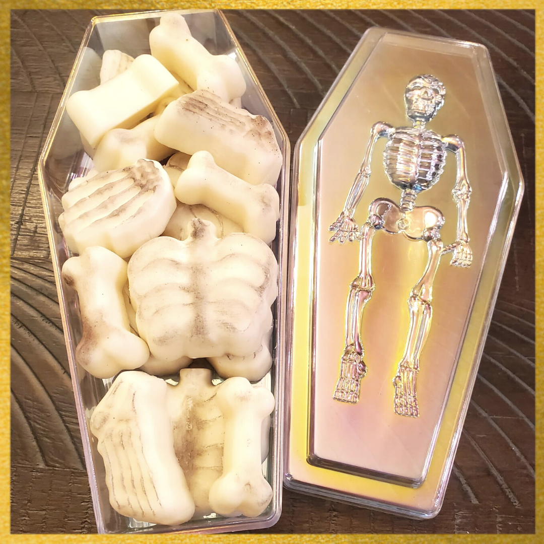 skele-bones Soy Wax Melts in a Coffin-Shaped Plastic Container