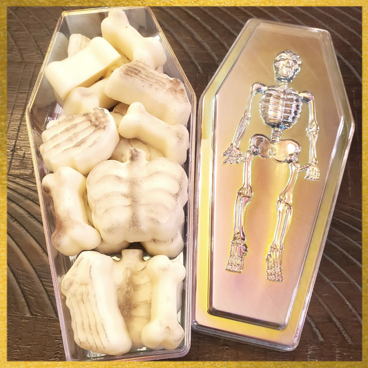 skele-bones Soy Wax Melts in a Coffin-Shaped Plastic Container